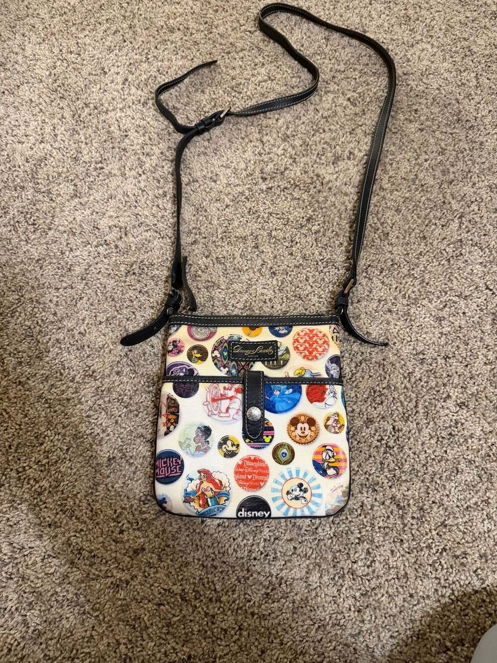 Dooney & Bourke White Crossbody Bag with Multicolor Disney Button Print